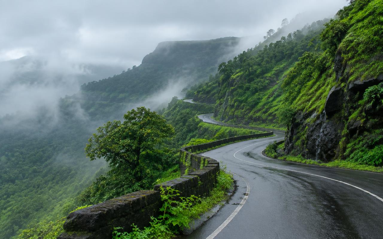 Winding ghat road through misty Sahyadri hills near Mahabaleshwar in monsoon — Pawna Lake